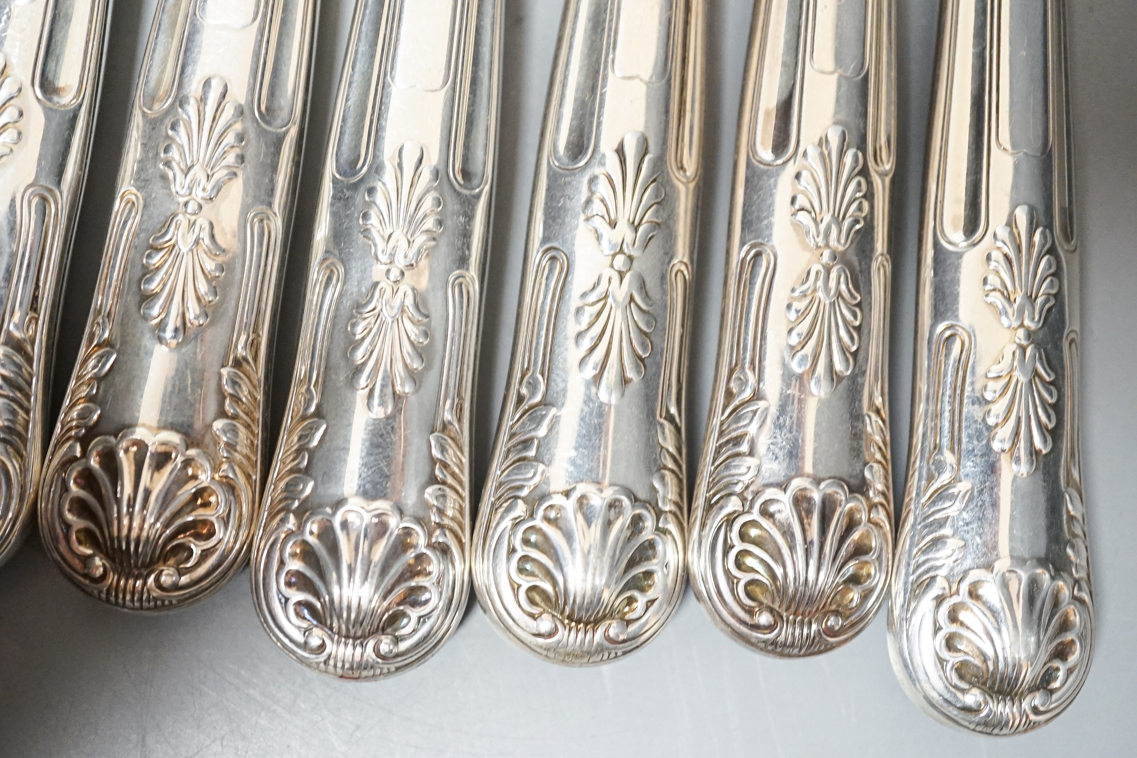 A set of six modern silver handled steel Kings pattern table knives and six matching dessert knives, A. Haviland Nye, Sheffield, 1973.